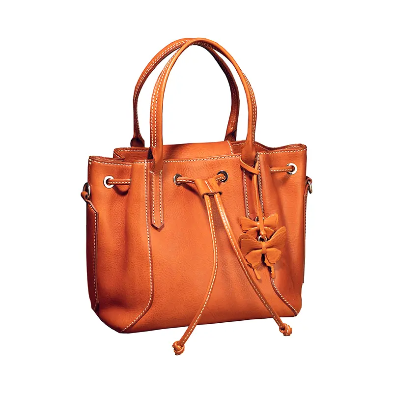 Perché scegliere una borsa in pelle conciata al vegetale con coulisse per stile e resistenza?