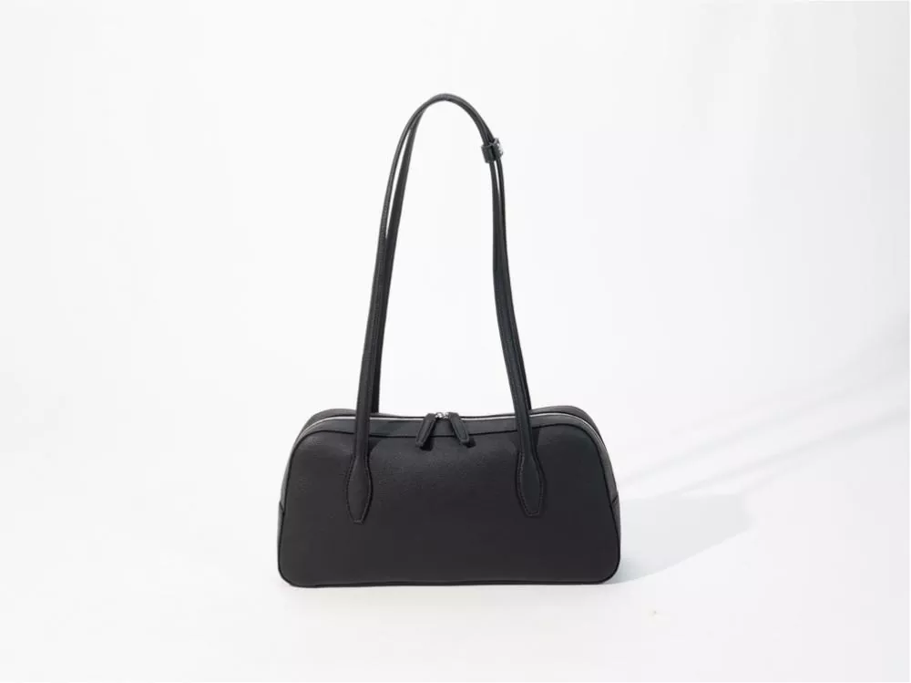 Come scegliere una borsa sottobraccio per pendolari? Una guida comparativa completa: materiali in PVC e PU